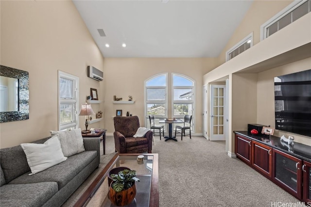 carpeted living room featuring high vaulted ceiling and a wall mounted AC