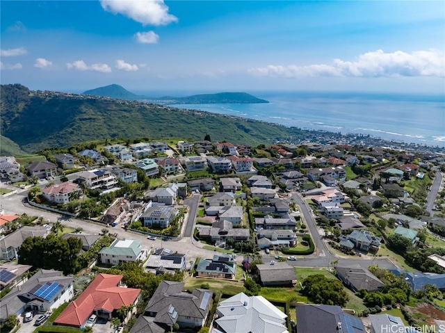 bird's eye view with a water and mountain view