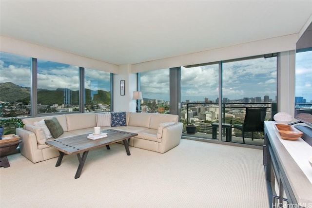 carpeted living room with a healthy amount of sunlight