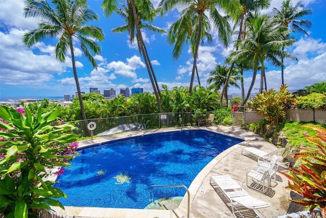 view of swimming pool with a patio