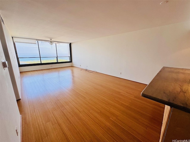 1600 Ala Moana Blvd Unit 3202, Honolulu, HI 96814 - unfurnished room with a ceiling fan and light wood-style flooring
