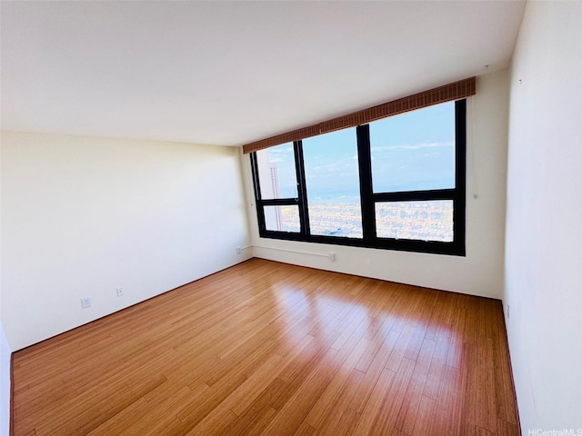 1600 Ala Moana Blvd Unit 3202, Honolulu, HI 96814 - unfurnished room with light wood-style flooring