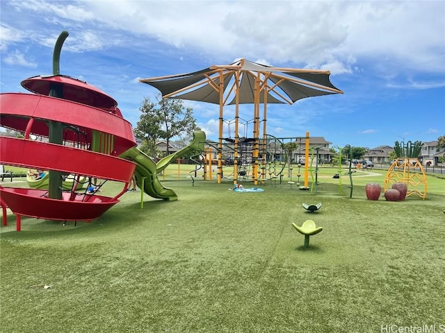 view of jungle gym with a lawn