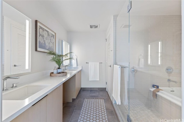 full bathroom with visible vents, a sink, a shower stall, and a bath