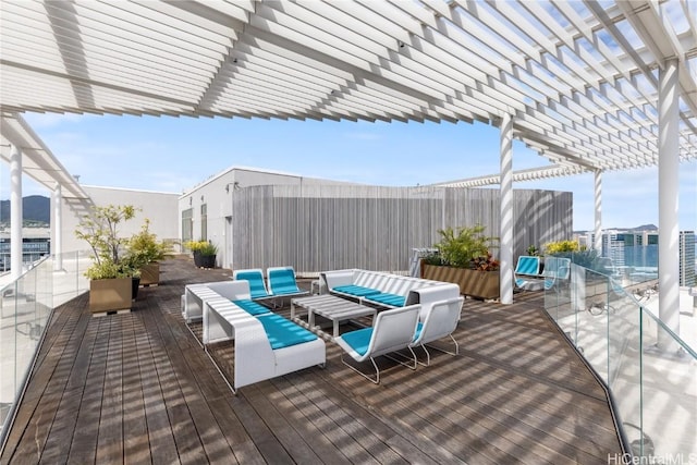 deck featuring an outdoor hangout area, outdoor dining area, and a pergola