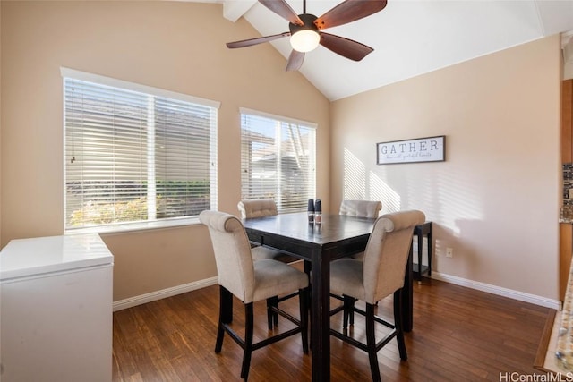 dining area with high vaulted ceiling, dark wood-style floors, baseboards, and a ceiling fan