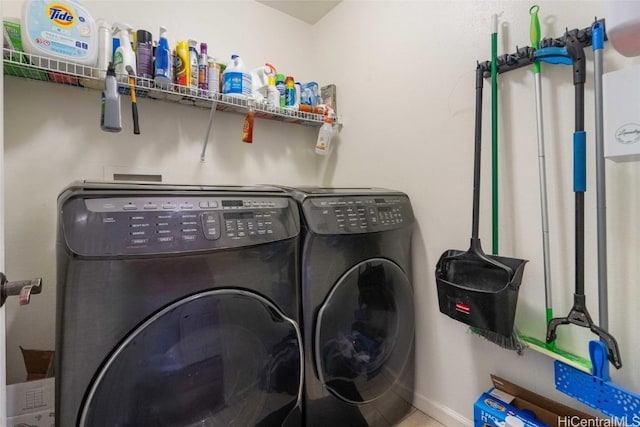 laundry room featuring laundry area and washing machine and dryer