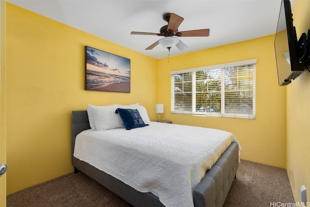 bedroom with ceiling fan and carpet flooring