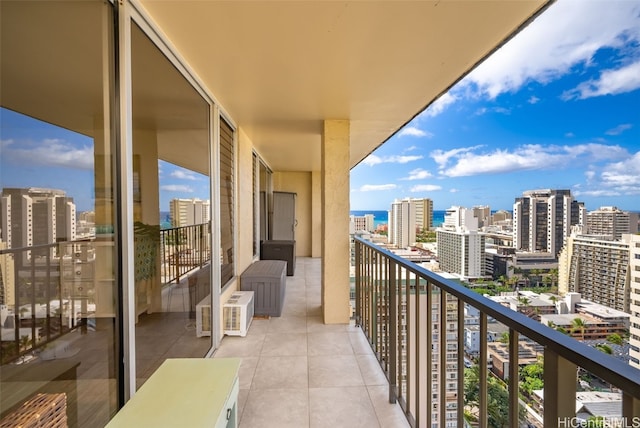 balcony featuring a city view