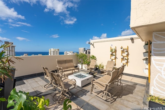 view of patio / terrace featuring a fire pit