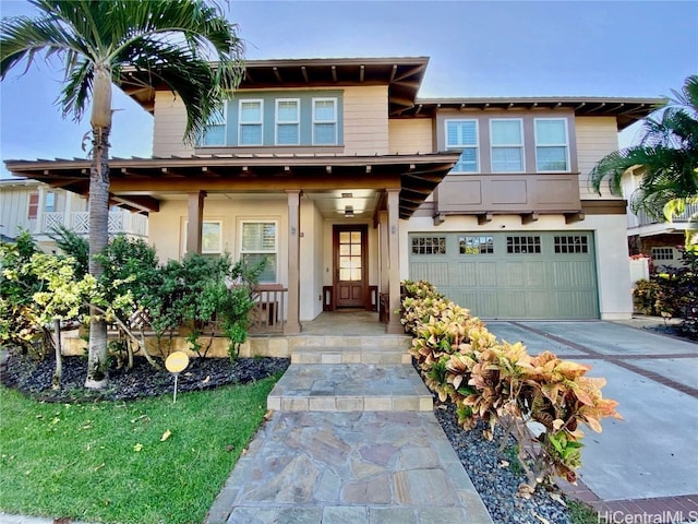 view of front of property featuring a garage