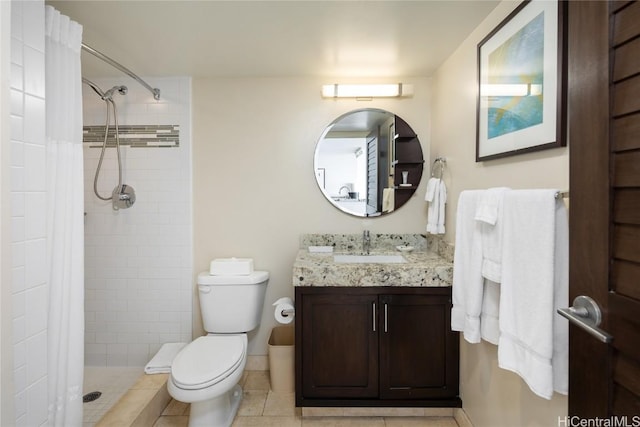 1777 Ala Moana Blvd Unit 2206, Honolulu, HI 96815 - bathroom featuring vanity, curtained shower, tile patterned floors, and toilet