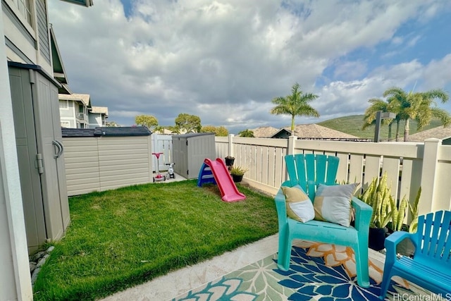 exterior space with a storage shed