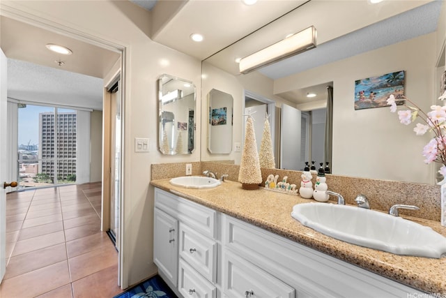 1212 Nuuanu Ave Unit 1412, Honolulu, HI 96817 - full bathroom with recessed lighting, tile patterned flooring, a sink, and double vanity