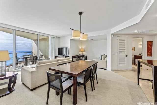 view of carpeted dining area