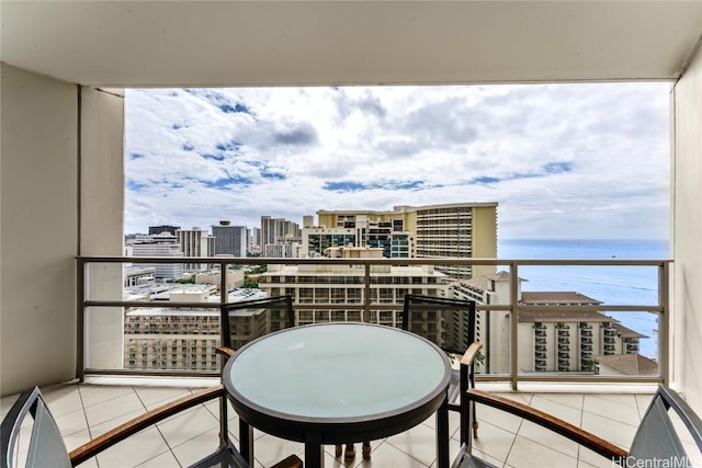 balcony featuring a water view