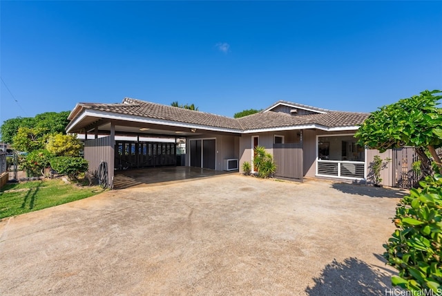 view of front facade with a carport