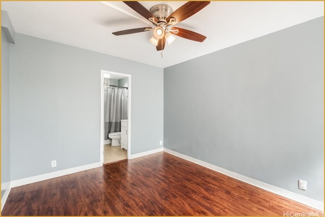 spare room featuring ceiling fan and light wood-type flooring