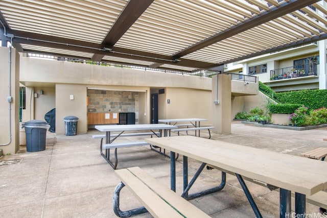 view of patio / terrace featuring outdoor dining space and a pergola