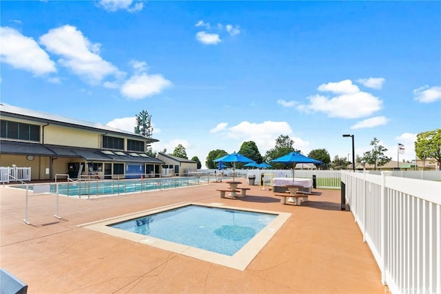 view of pool with a patio area