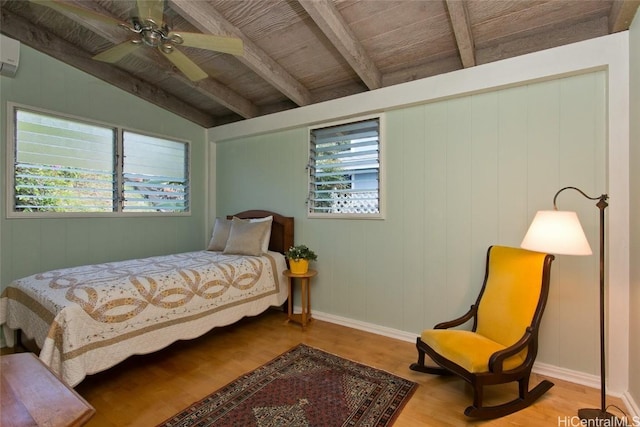 bedroom featuring lofted ceiling with beams, multiple windows, wooden ceiling, and wood finished floors