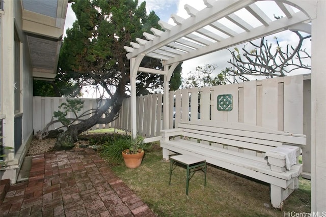 view of patio with fence and a pergola