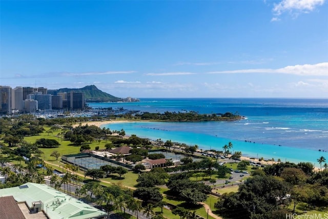 aerial view with a water view, a beach view, and a city view