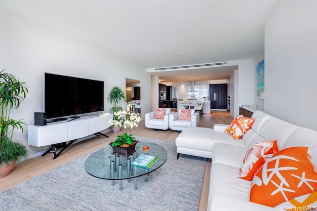 living room with wood finished floors