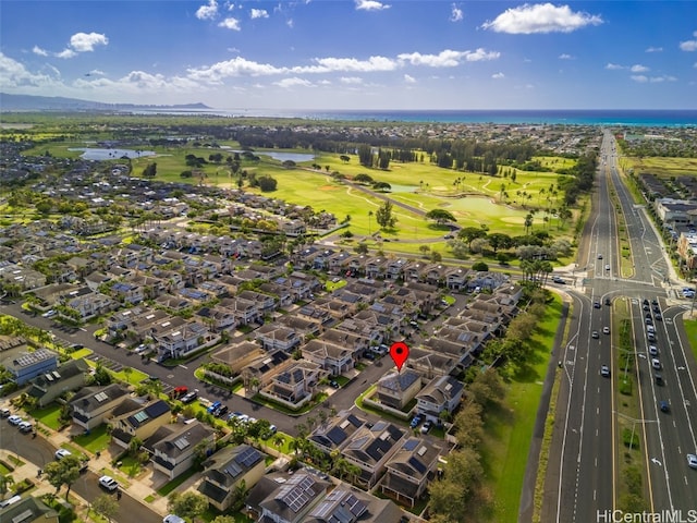 bird's eye view with a residential view, view of golf course, and a water view