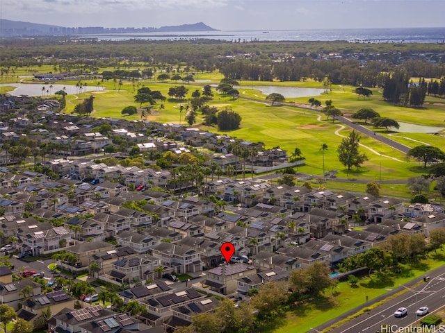 aerial view featuring view of golf course, a water view, and a residential view