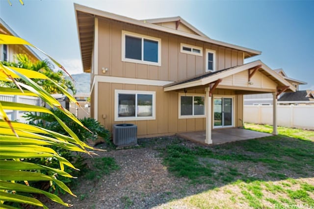 back of property featuring a patio and central AC unit