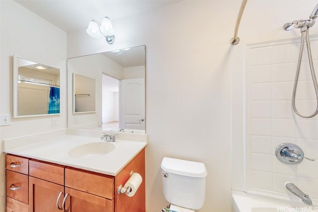 full bathroom featuring toilet, vanity, and shower / bath combo with shower curtain