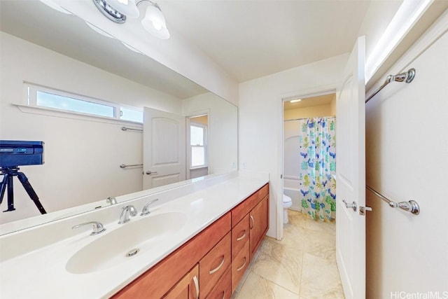 full bathroom featuring vanity, toilet, and shower / bath combo