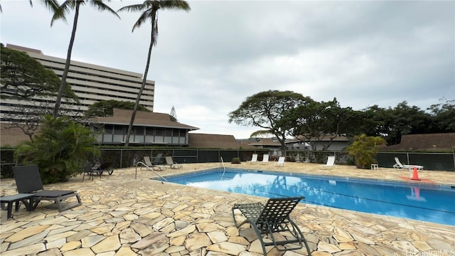 view of swimming pool featuring a patio