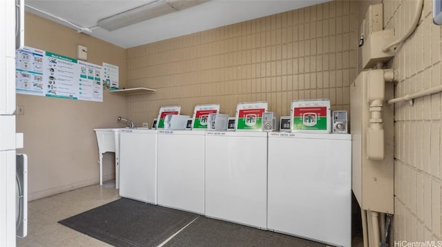 laundry room with washer and clothes dryer