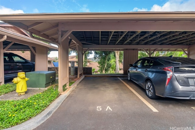 view of car parking featuring a carport