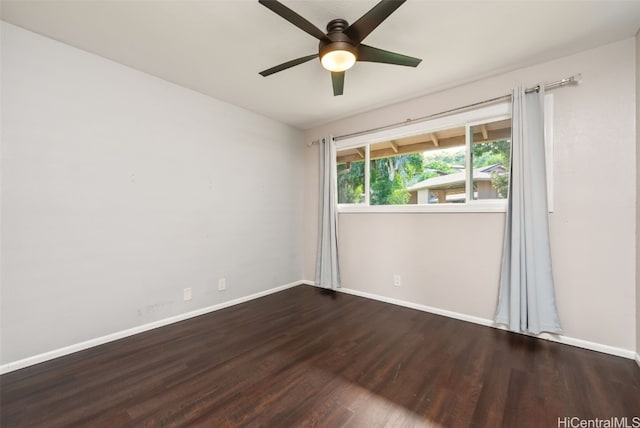 spare room featuring ceiling fan and wood-type flooring