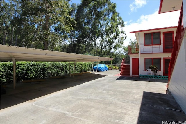 view of parking featuring a carport