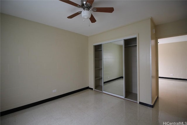 unfurnished bedroom with a closet and ceiling fan