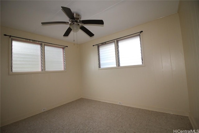 spare room featuring ceiling fan