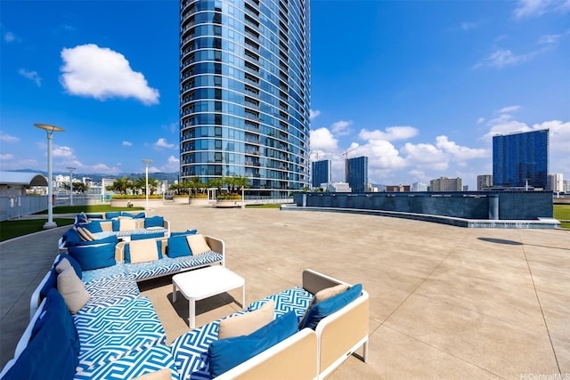1288 Kapiolani Blvd Unit I-1707, Honolulu, HI 96814 - view of patio with outdoor lounge area and a city view