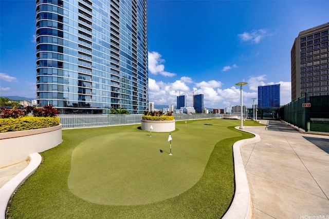 1288 Kapiolani Blvd Unit I-1707, Honolulu, HI 96814 - surrounding community with a city view and a putting area