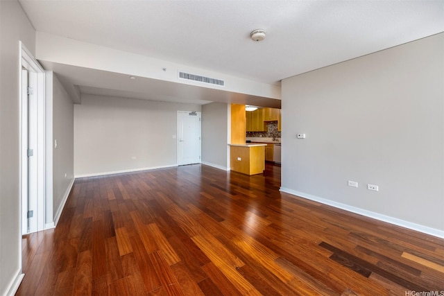 1288 Kapiolani Blvd Unit I-1707, Honolulu, HI 96814 - spare room with dark wood-type flooring, a smoke detector, and baseboards