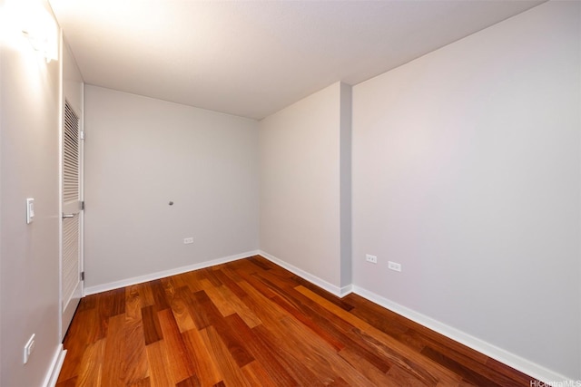 1288 Kapiolani Blvd Unit I-1707, Honolulu, HI 96814 - empty room featuring wood finished floors and baseboards