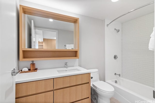 full bathroom with toilet, vanity, and bathing tub / shower combination