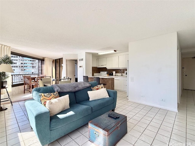 living room with a textured ceiling