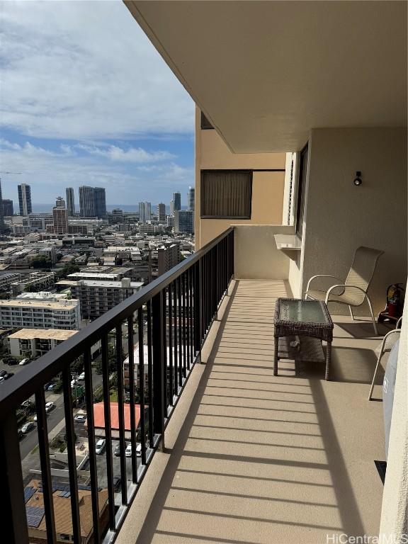 balcony featuring a city view