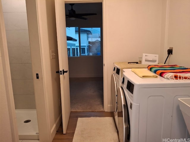 washroom with ceiling fan, independent washer and dryer, and light hardwood / wood-style floors