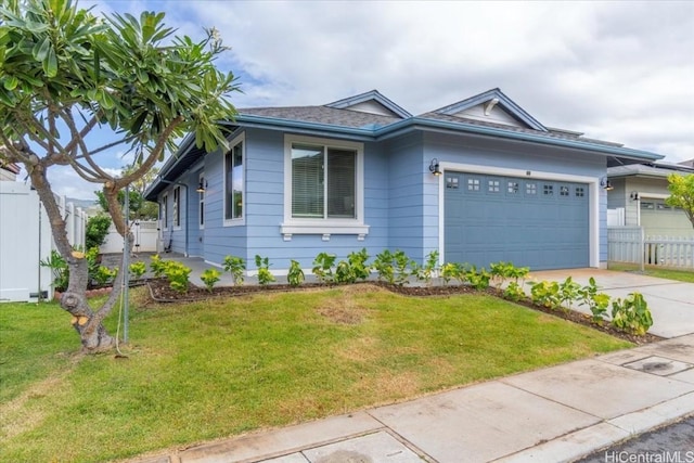 single story home with a front lawn, concrete driveway, fence, and a garage