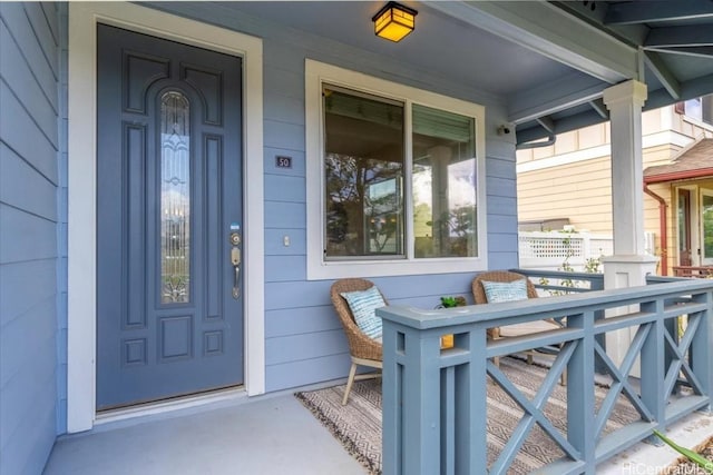 property entrance with a porch